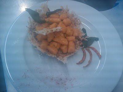 Gnocchi di zucca con burro nocciola e ricotta affumicata